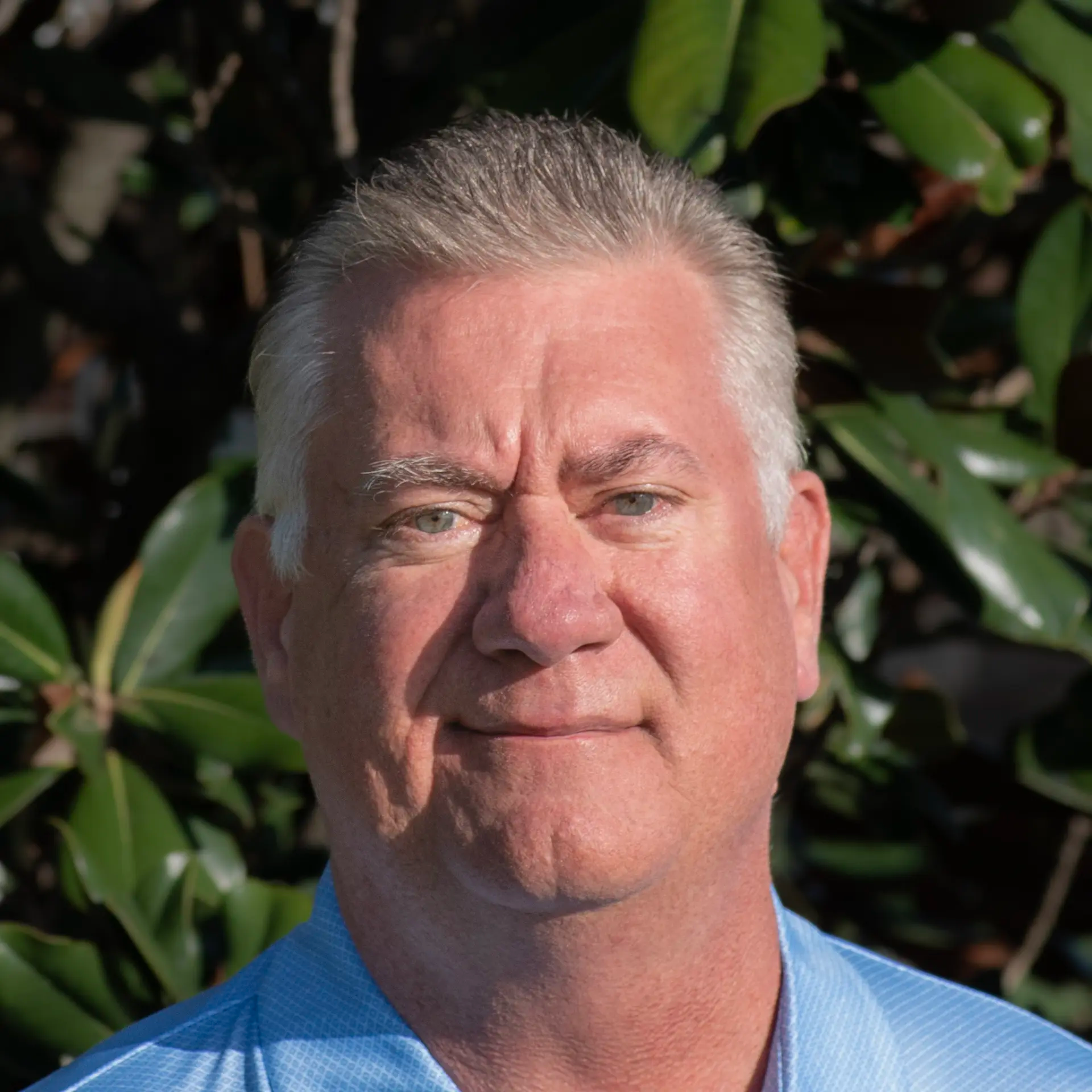 A headshot of Chris Tate, Founder of Capstone Advisors